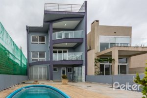 Casa em Condomínio à venda com 346m², 3 dormitórios, 1 suíte, 3 vagas, no bairro Ipanema em PORTO ALEGRE