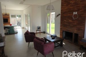 Casa em Condomínio à venda com 209m², 4 dormitórios, 2 suítes, 3 vagas, no bairro Hipica em PORTO ALEGRE