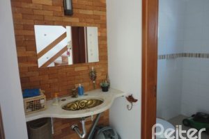 Casa em Condomínio à venda com 209m², 4 dormitórios, 2 suítes, 3 vagas, no bairro Hipica em PORTO ALEGRE