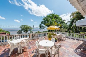 Casa à venda com 347m², 3 dormitórios, 3 suítes, 3 vagas, no bairro Sétimo Céu em Porto Alegre