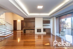 Casa à venda com 355m², 4 dormitórios, 4 suítes, 4 vagas, no bairro Vila Assunção em Porto Alegre