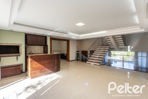 Casa à venda com 355m², 4 dormitórios, 4 suítes, 4 vagas, no bairro Vila Assunção em Porto Alegre