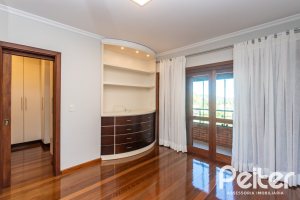 Casa à venda com 355m², 4 dormitórios, 4 suítes, 4 vagas, no bairro Vila Assunção em Porto Alegre