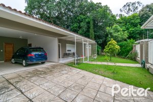 Casa em Condomínio à venda com 213m², 4 dormitórios, 3 suítes, 4 vagas, no bairro Vila Nova em Porto Alegre