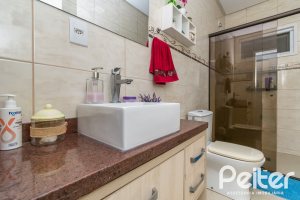 Casa em Condomínio à venda com 213m², 4 dormitórios, 3 suítes, 4 vagas, no bairro Vila Nova em Porto Alegre