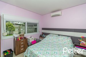 Casa em Condomínio à venda com 213m², 4 dormitórios, 3 suítes, 4 vagas, no bairro Vila Nova em Porto Alegre