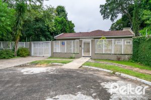 Casa em Condomínio à venda com 213m², 4 dormitórios, 3 suítes, 4 vagas, no bairro Vila Nova em Porto Alegre