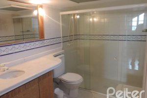 Casa em Condomínio à venda com 270m², 3 dormitórios, 1 suíte, 2 vagas, no bairro Tristeza em Porto Alegre