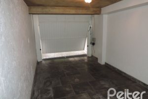 Casa em Condomínio à venda com 270m², 3 dormitórios, 1 suíte, 2 vagas, no bairro Tristeza em Porto Alegre