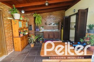 Casa à venda com 179m², 3 dormitórios, 1 suíte, 3 vagas, no bairro Tristeza em Porto Alegre