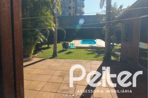 Casa à venda com 179m², 3 dormitórios, 1 suíte, 3 vagas, no bairro Tristeza em Porto Alegre