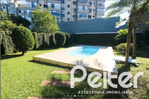 Casa à venda com 179m², 3 dormitórios, 1 suíte, 3 vagas, no bairro Tristeza em Porto Alegre