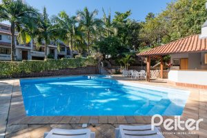 Casa em Condomínio à venda com 174m², 3 dormitórios, 1 suíte, 3 vagas, no bairro Tristeza em Porto Alegre