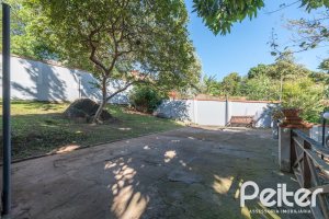 Casa em Condomínio à venda com 174m², 3 dormitórios, 1 suíte, 3 vagas, no bairro Tristeza em Porto Alegre