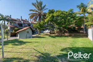 Casa em Condomínio à venda com 174m², 3 dormitórios, 1 suíte, 3 vagas, no bairro Tristeza em Porto Alegre