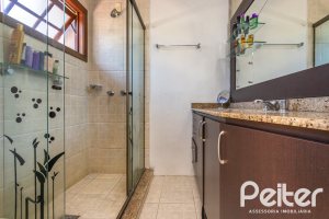 Casa em Condomínio à venda com 174m², 3 dormitórios, 1 suíte, 3 vagas, no bairro Tristeza em Porto Alegre