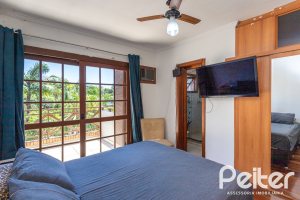 Casa em Condomínio à venda com 174m², 3 dormitórios, 1 suíte, 3 vagas, no bairro Tristeza em Porto Alegre