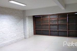 Casa em Condomínio à venda com 384m², 3 dormitórios, 1 suíte, 4 vagas, no bairro Cristal em PORTO ALEGRE