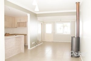 Casa em Condomínio à venda com 230m², 3 dormitórios, 1 suíte, 2 vagas, no bairro Jardim Isabel em Porto Alegre