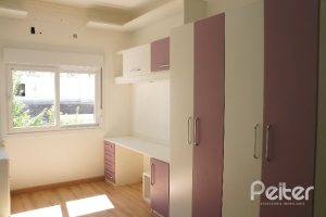 Casa em Condomínio à venda com 230m², 3 dormitórios, 1 suíte, 2 vagas, no bairro Jardim Isabel em Porto Alegre