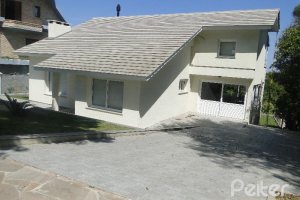 Casa em Condomínio à venda com 288m², 4 dormitórios, 2 suítes, 2 vagas, no bairro Knorr em Porto Alegre