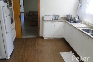 Casa em Condomínio à venda com 288m², 4 dormitórios, 2 suítes, 2 vagas, no bairro Knorr em Porto Alegre