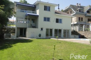 Casa em Condomínio à venda com 288m², 4 dormitórios, 2 suítes, 2 vagas, no bairro Knorr em Porto Alegre