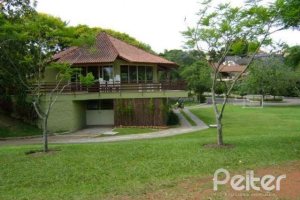 Casa em Condomínio à venda com 288m², 4 dormitórios, 2 suítes, 2 vagas, no bairro Knorr em Porto Alegre