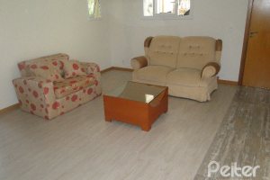 Casa em Condomínio à venda com 288m², 4 dormitórios, 2 suítes, 2 vagas, no bairro Knorr em Porto Alegre