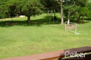 Casa em Condomínio à venda com 288m², 4 dormitórios, 2 suítes, 2 vagas, no bairro Knorr em Porto Alegre