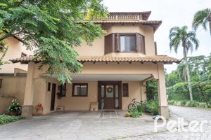 Casa em Condomínio à venda com 339m², 3 dormitórios, 1 suíte, 3 vagas, no bairro Tristeza em PORTO ALEGRE