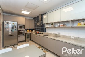 Casa em Condomínio à venda com 339m², 3 dormitórios, 1 suíte, 3 vagas, no bairro Tristeza em PORTO ALEGRE