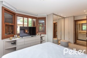 Casa em Condomínio à venda com 339m², 3 dormitórios, 1 suíte, 3 vagas, no bairro Tristeza em PORTO ALEGRE