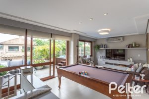 Casa em Condomínio à venda com 339m², 3 dormitórios, 1 suíte, 3 vagas, no bairro Tristeza em PORTO ALEGRE