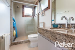 Casa em Condomínio à venda com 339m², 3 dormitórios, 1 suíte, 3 vagas, no bairro Tristeza em PORTO ALEGRE