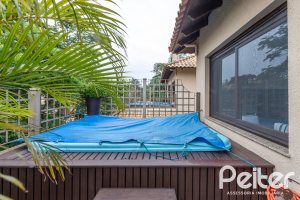 Casa em Condomínio à venda com 339m², 3 dormitórios, 1 suíte, 3 vagas, no bairro Tristeza em PORTO ALEGRE