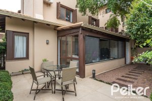 Casa em Condomínio à venda com 339m², 3 dormitórios, 1 suíte, 3 vagas, no bairro Tristeza em PORTO ALEGRE