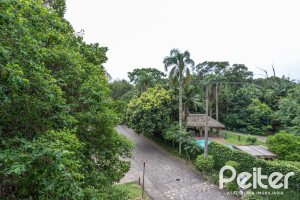 Casa em Condomínio à venda com 339m², 3 dormitórios, 1 suíte, 3 vagas, no bairro Tristeza em PORTO ALEGRE