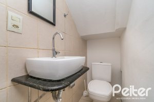 Casa em Condomínio à venda com 118m², 3 dormitórios, 1 suíte, 2 vagas, no bairro Cristal em Porto Alegre