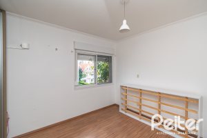 Casa em Condomínio à venda com 118m², 3 dormitórios, 1 suíte, 2 vagas, no bairro Cristal em Porto Alegre