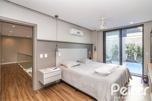 Casa em Condomínio à venda com 411m², 4 dormitórios, 4 suítes, 6 vagas, no bairro Alphaville em PORTO ALEGRE