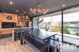 Casa em Condomínio à venda com 411m², 4 dormitórios, 4 suítes, 6 vagas, no bairro Alphaville em PORTO ALEGRE