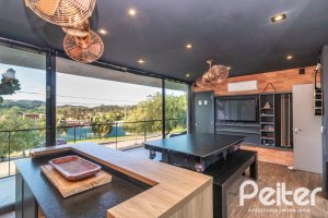 Casa em Condomínio à venda com 411m², 4 dormitórios, 4 suítes, 6 vagas, no bairro Alphaville em PORTO ALEGRE