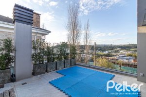 Casa em Condomínio à venda com 411m², 4 dormitórios, 4 suítes, 6 vagas, no bairro Alphaville em PORTO ALEGRE