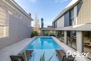 Casa em Condomínio à venda com 411m², 4 dormitórios, 4 suítes, 6 vagas, no bairro Alphaville em PORTO ALEGRE
