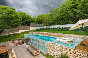 Casa em Condomínio à venda com 300m², 4 dormitórios, 4 suítes, 4 vagas, no bairro Alphaville em PORTO ALEGRE