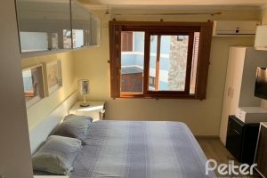 Casa em Condomínio à venda com 122m², 3 dormitórios, 1 suíte, 2 vagas, no bairro Cristal em Porto Alegre