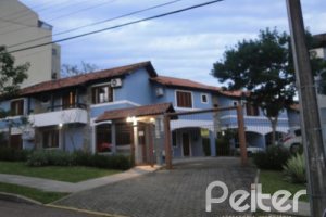 Casa em Condomínio à venda com 122m², 3 dormitórios, 1 suíte, 2 vagas, no bairro Cristal em Porto Alegre