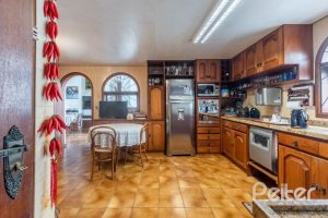 Casa à venda com 456m², 3 dormitórios, 3 suítes, 5 vagas, no bairro Vila Assunção em Porto Alegre