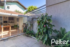 Casa em Condomínio à venda com 159m², 3 dormitórios, 1 suíte, 2 vagas, no bairro Tristeza em Porto Alegre